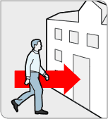 Image of an oversized man walking toward a building.